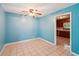 Cozy dining area featuring tile floors and a doorway that leads into the kitchen at 2880 Shallowford Rd, Chamblee, GA 30341