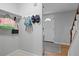 Entryway featuring a coat rack, neutral paint, and hardwood floors at 9470 Hillside Dr, Roswell, GA 30076