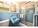 Classic bathroom with vintage blue tile, shower, and updated fixtures at 2518 Foster Ridge Ne Ct, Atlanta, GA 30345