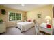 Sunny bedroom with large window and desk is perfect for working from home at 2518 Foster Ridge Ne Ct, Atlanta, GA 30345