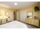 Bright bedroom features a bed, matching dressers, and a sunny window at 2518 Foster Ridge Ne Ct, Atlanta, GA 30345