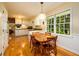 Charming eat-in kitchen space with an adjacent dining table and scenic window views is cozy at 2518 Foster Ridge Ne Ct, Atlanta, GA 30345