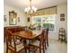 Elegant dining room with a chandelier, classic furniture, and a large window at 2518 Foster Ridge Ne Ct, Atlanta, GA 30345