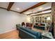 Charming living room featuring hardwood floors, beamed ceilings, and a cozy layout at 2518 Foster Ridge Ne Ct, Atlanta, GA 30345