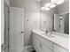 Modern bathroom with vanity and ample lighting at 4526 Meadow Club Dr, Suwanee, GA 30024