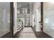 Grand foyer with soaring ceilings, hardwood floors, open staircase, and elegant decor at 4526 Meadow Club Dr, Suwanee, GA 30024