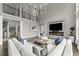 Open concept living room with fireplace, soaring ceilings, and modern finishes at 4526 Meadow Club Dr, Suwanee, GA 30024