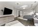 Spacious main bedroom with modern decor, tray ceilings, and ample natural light at 4526 Meadow Club Dr, Suwanee, GA 30024