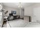 Bright office features modern lighting, large rug, dual workstations, and stylish decor at 4526 Meadow Club Dr, Suwanee, GA 30024