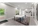 This recreation area has natural light, ping pong table and access to outdoor pool at 4526 Meadow Club Dr, Suwanee, GA 30024