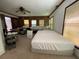Bedroom features a ceiling fan, natural light, and lots of space at 4701 Cleveland Rd, Lithonia, GA 30038