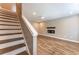 Basement featuring wood-look floors, recessed lighting, and stairs to the upper floor at 620 Waynes Se Ct, Atlanta, GA 30354
