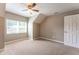 Bedroom featuring carpet, a ceiling fan, a white door, and natural light at 620 Waynes Se Ct, Atlanta, GA 30354