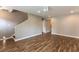 Living room featuring hardwood floors and a staircase at 620 Waynes Se Ct, Atlanta, GA 30354