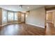 Living room featuring hardwood floors, staircase, and bay windows at 620 Waynes Se Ct, Atlanta, GA 30354