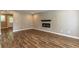 Living room featuring hardwood floors and a modern fireplace at 620 Waynes Se Ct, Atlanta, GA 30354