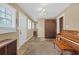 Bonus room featuring a piano, tile floors, and windows that provide natural light at 730 Brownwood Se Ave, Atlanta, GA 30316