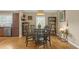 Cozy dining area with table, chairs, and bookshelves, bathed in natural light at 730 Brownwood Se Ave, Atlanta, GA 30316
