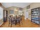 Inviting dining area with table, seating, bookshelves, and decorative art at 730 Brownwood Se Ave, Atlanta, GA 30316