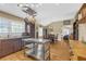 Modern kitchen with stainless steel appliances, pot rack, and an island, flowing into dining area at 730 Brownwood Se Ave, Atlanta, GA 30316
