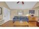 Spacious living room featuring wood floors, vaulted ceiling, and stylish decor at 730 Brownwood Se Ave, Atlanta, GA 30316