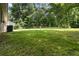 A large yard with plenty of space for activities and entertainment at 924 Sweetwater Cir, Lawrenceville, GA 30044