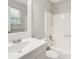 A cozy bathroom with a mirror and tub for a relaxing experience at 924 Sweetwater Cir, Lawrenceville, GA 30044