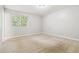 This bedroom is bright and offers a great view to the backyard at 924 Sweetwater Cir, Lawrenceville, GA 30044