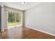 View of dining area with sliding glass door, offering a seamless connection to the outdoors at 924 Sweetwater Cir, Lawrenceville, GA 30044