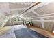 Unfinished bonus room with natural light offers potential for customization at 119 Castlewood Rd, Tyrone, GA 30290