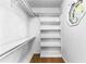 Walk-in closet with built-in shelving and clothes rails for optimal storage at 119 Castlewood Rd, Tyrone, GA 30290