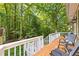 Relax on the deck with wooded views at 119 Castlewood Rd, Tyrone, GA 30290
