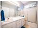 Bright bathroom featuring double sinks, modern fixtures, and a shower over tub at 175 Robin Ct, Fayetteville, GA 30215