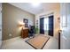 This comfortable bedroom has neutral walls and trim plus a large window for natural light at 175 Robin Ct, Fayetteville, GA 30215