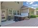 Backyard with hot tub, deck, and outdoor seating area at 3320 Pleasant Springs Dr, Cumming, GA 30028