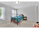 Cozy bedroom with a plush carpet, natural light and a decorative teddy bear at 3320 Pleasant Springs Dr, Cumming, GA 30028
