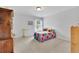 Bedroom featuring natural light and closet at 3320 Pleasant Springs Dr, Cumming, GA 30028