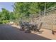 Spacious deck featuring a dining set and bench, ideal for outdoor meals and gatherings at 3320 Pleasant Springs Dr, Cumming, GA 30028
