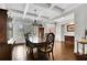 Formal dining room features hardwood flooring, elegant decor, and lots of natural light at 3320 Pleasant Springs Dr, Cumming, GA 30028