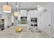 Kitchen featuring granite countertops, stainless steel appliances, and an island with bar seating at 3320 Pleasant Springs Dr, Cumming, GA 30028