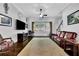 Spacious living room with hardwood floors, neutral paint, and a cozy atmosphere at 3320 Pleasant Springs Dr, Cumming, GA 30028