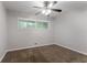 Bedroom featuring a ceiling fan, a window, carpet, and neutral-colored walls at 3409 Hyland Dr, Decatur, GA 30032