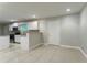 Open-concept kitchen with white cabinets, stainless steel appliances, and ample counter space at 3409 Hyland Dr, Decatur, GA 30032
