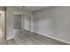 Bedroom with mirrored closet doors, hardwood flooring at 4735 Widgeon Way, Cumming, GA 30028