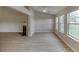 Spacious living room with vaulted ceilings, fireplace, and many windows at 4735 Widgeon Way, Cumming, GA 30028
