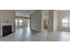 Open-concept living space with fireplace, wood floors, and natural light at 4735 Widgeon Way, Cumming, GA 30028