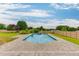 Beautiful inground pool with a stone paver surround, offering a relaxing backyard retreat at 4735 Widgeon Way, Cumming, GA 30028