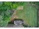 Aerial view of a sprawling yard with a deck, lawn, and playground area at 1952 Sugarstone Dr, Lawrenceville, GA 30043