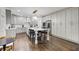 Spacious kitchen featuring white cabinets, stainless steel appliances, and a large center island at 1952 Sugarstone Dr, Lawrenceville, GA 30043