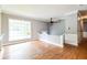 Inviting living area showcasing hardwood floors, chair railing, and bright natural light at , Forest Park, GA 30297